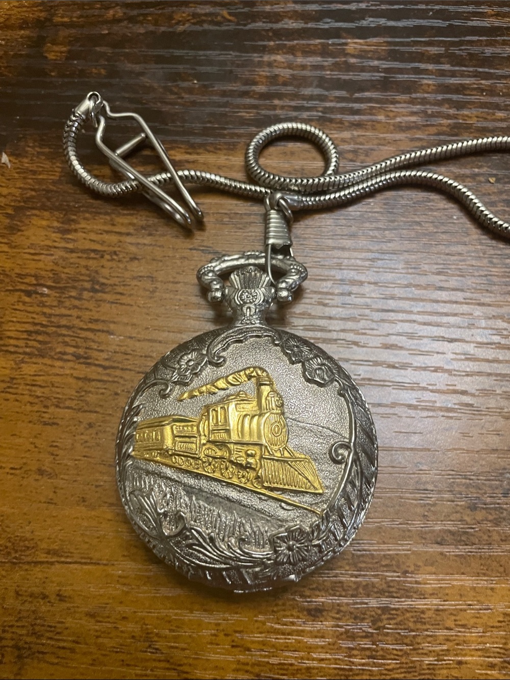 vintage Futura Mechanical pocket watch with fancy gold metal case chain train